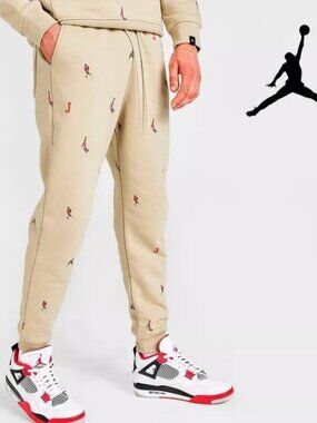 NWoT Nike Air Jordan MJ Essentials Holiday Fleece Pants All Over Printed Beige